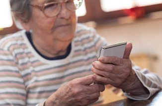 Old Lady Smartphone Istock 1305481156 Thodonal